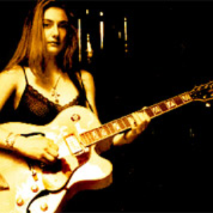 Olga Taсon